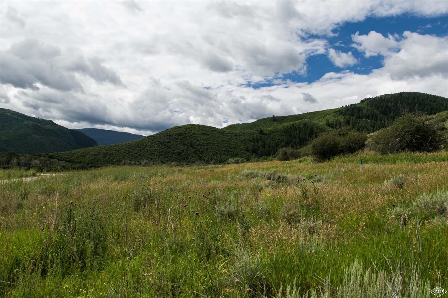 36 Squires Lane Eagle, CO 81631 - Photo 5 of 6 a view of lake with green space