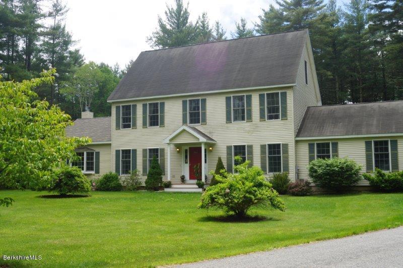 708 Clayton Road Sheffield, MA 01222 - Photo 1 of 19 a front view of a house with a garden