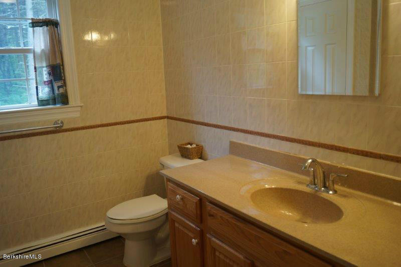 708 Clayton Road Sheffield, MA 01222 - Photo 15 of 19 a bathroom with a sink and a toilet