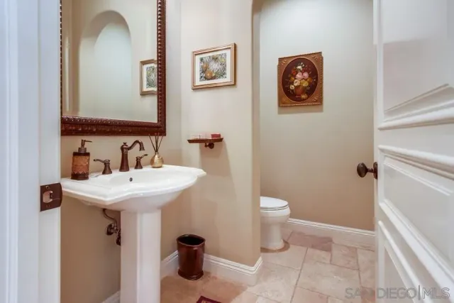 a bathroom with a sink and a toilet