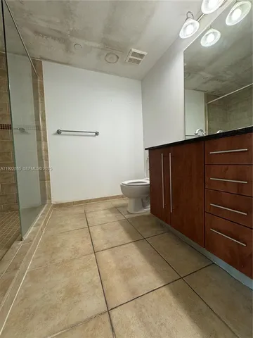 a bathroom with a toilet
