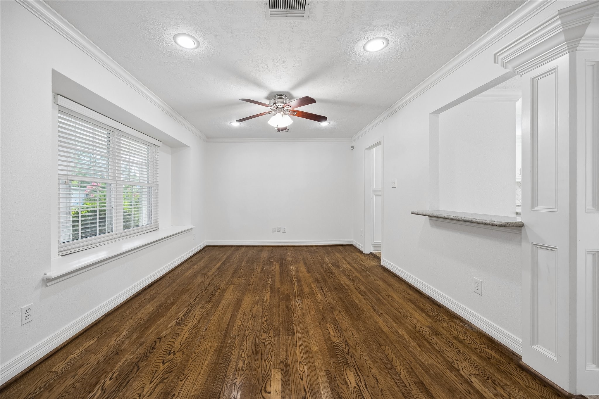 5019 Kinglet Street Houston, TX 77035 - Photo 5 of 24 Dining room boasts plenty of space for large dining table & hutch. Note freshly painted walls throughout home!