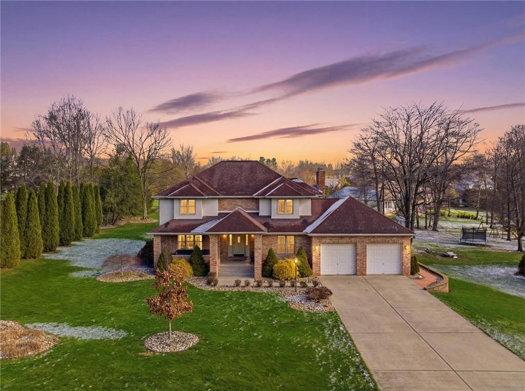 103 Seminole Trail Butler, PA 16001 - Photo 1 of 50 a front view of a house with garden