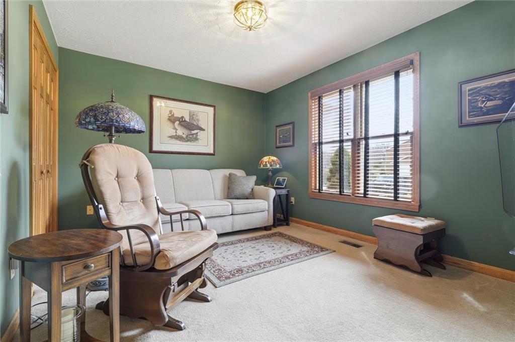 103 Seminole Trail Butler, PA 16001 - Photo 14 of 50 a living room with furniture and a window