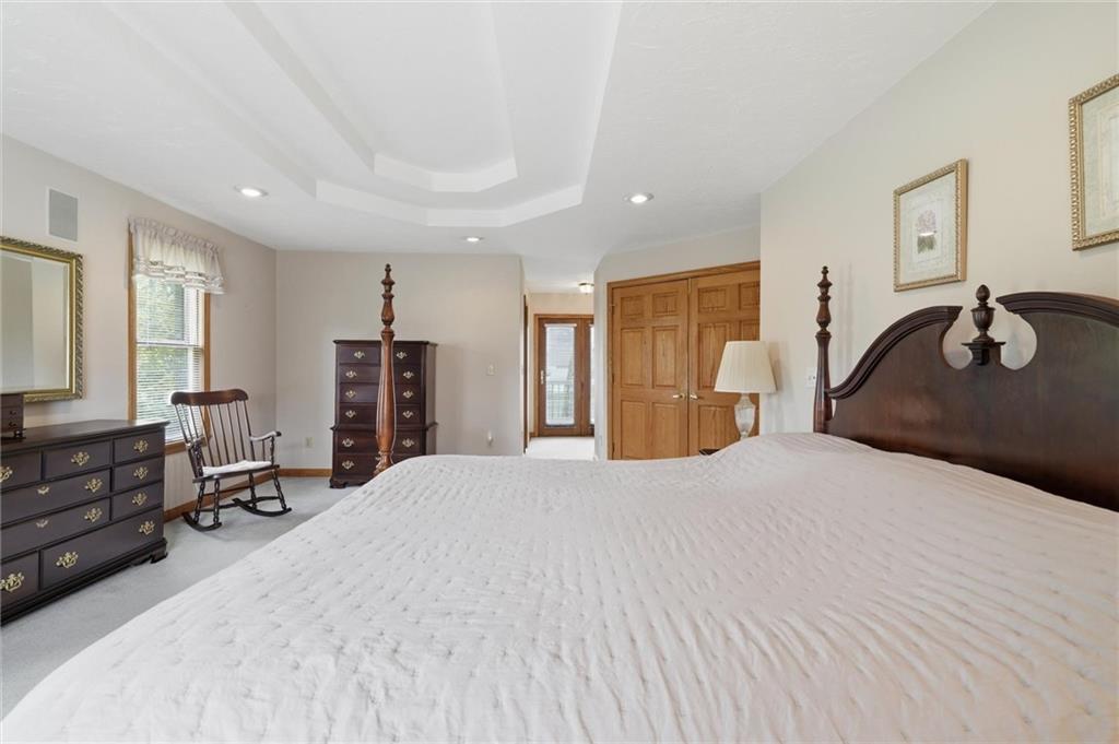 103 Seminole Trail Butler, PA 16001 - Photo 20 of 50 a bedroom with a bed dresser and a large window