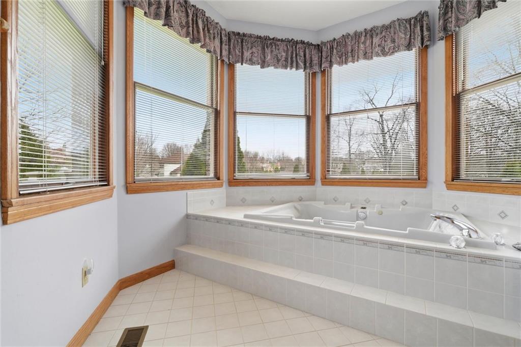 103 Seminole Trail Butler, PA 16001 - Photo 22 of 50 a bathroom with a bathtub and a sink