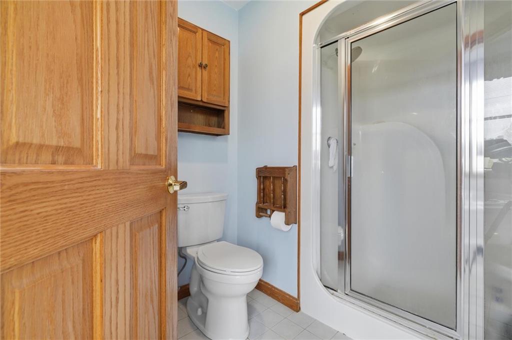 103 Seminole Trail Butler, PA 16001 - Photo 23 of 50 a bathroom with a toilet a sink and shower