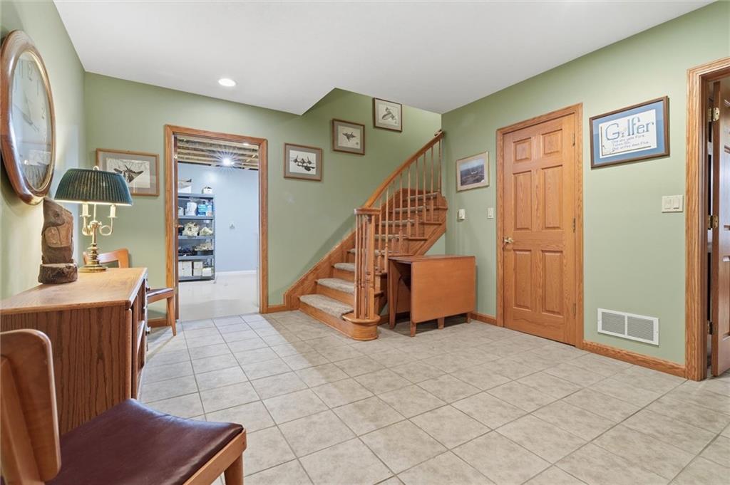 103 Seminole Trail Butler, PA 16001 - Photo 27 of 50 a view of a livingroom with furniture and staircase