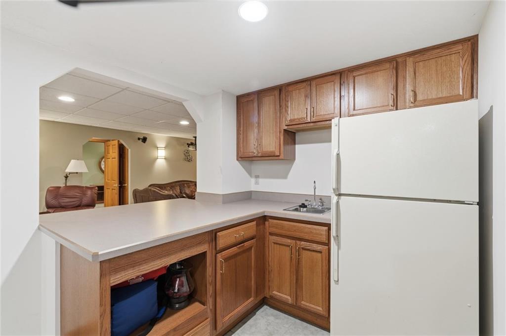 103 Seminole Trail Butler, PA 16001 - Photo 33 of 50 a kitchen with stainless steel appliances a refrigerator and a sink