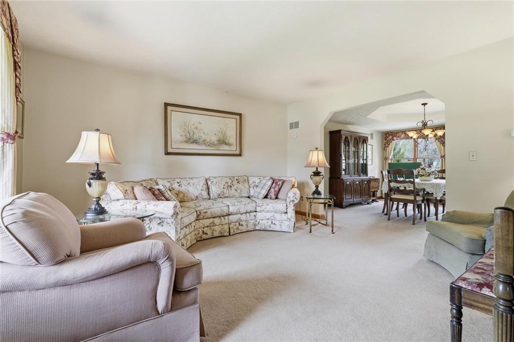 103 Seminole Trail Butler, PA 16001 - Photo 4 of 50 a living room with furniture and a table