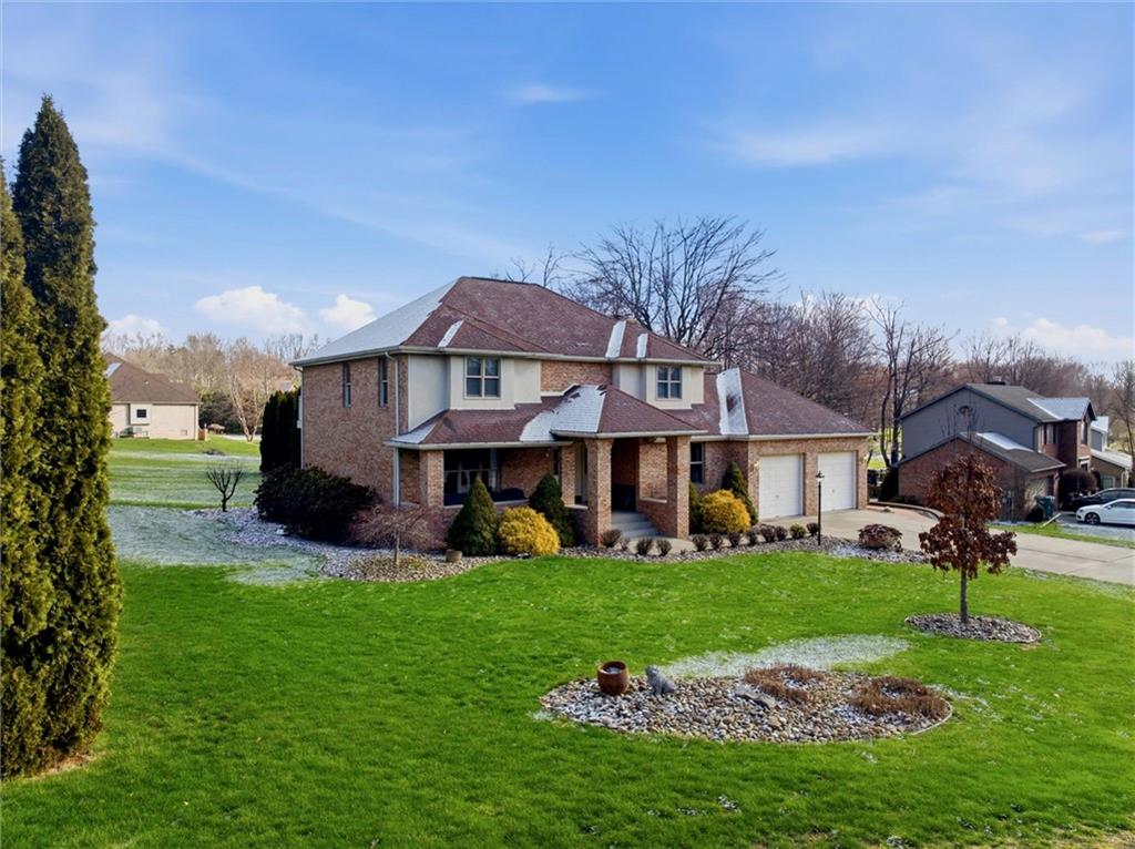 103 Seminole Trail Butler, PA 16001 - Photo 43 of 50 a view of a house with a big yard and large trees