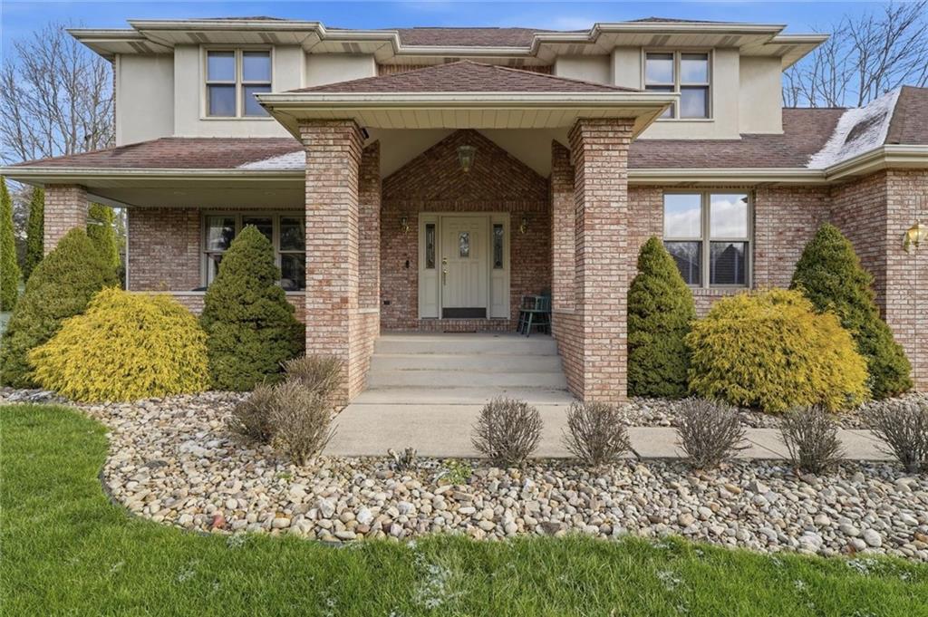 103 Seminole Trail Butler, PA 16001 - Photo 45 of 50 a front view of a house with a garden