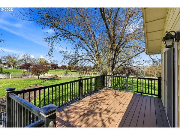 a view of a house with a big yard