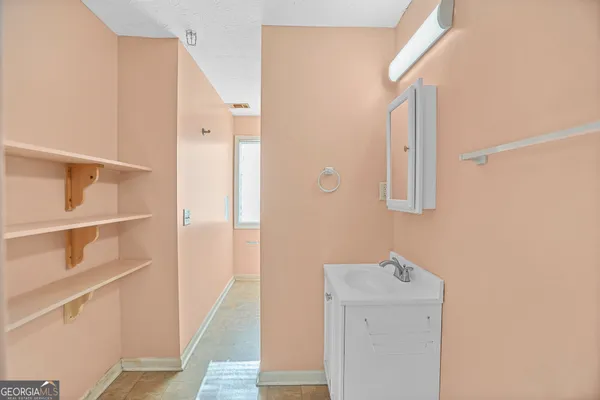 a room with furniture and a window