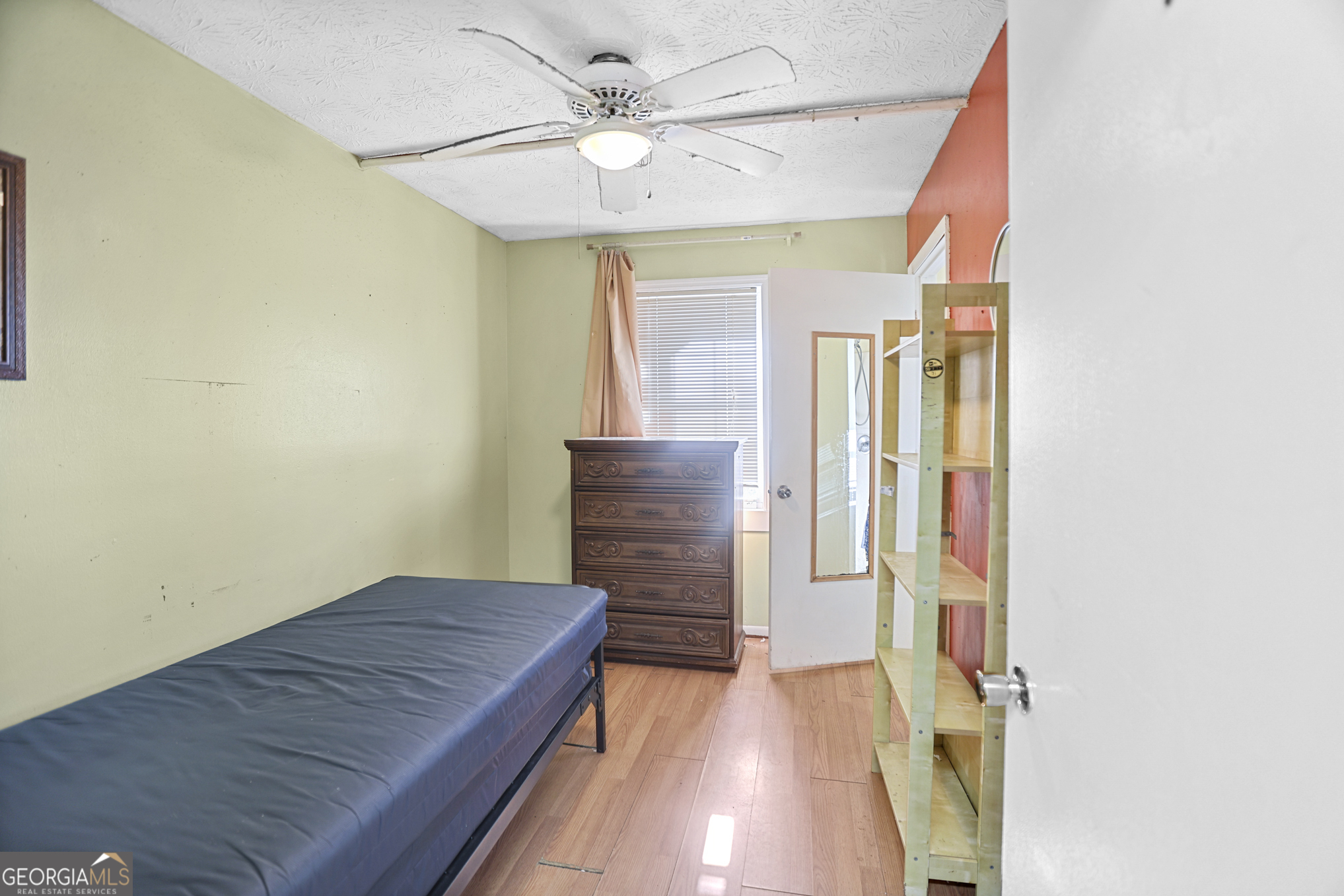 492 Pine Road Newnan, GA 30263 - Photo 20 of 36 a view of a hallway with wooden floor and closet