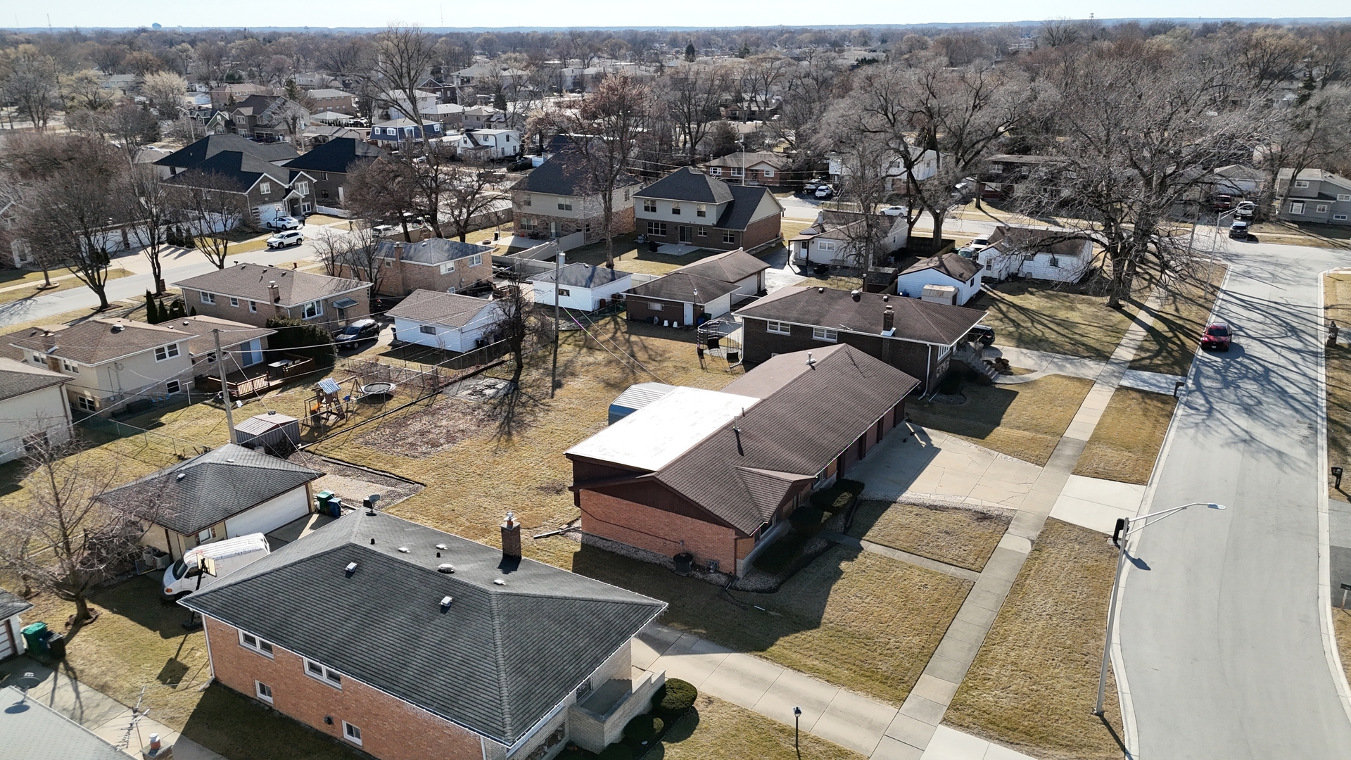 4937 West 85th Place Burbank, IL 60459 - Photo 28 of 32 an aerial view of multiple houses with yard