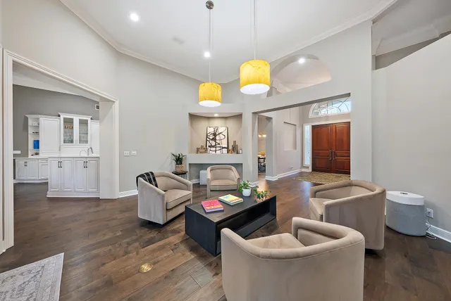 a living room with furniture and a table