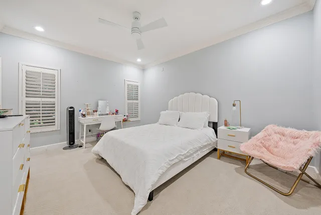 a en suite bathroom with a sink a mirror and a shower