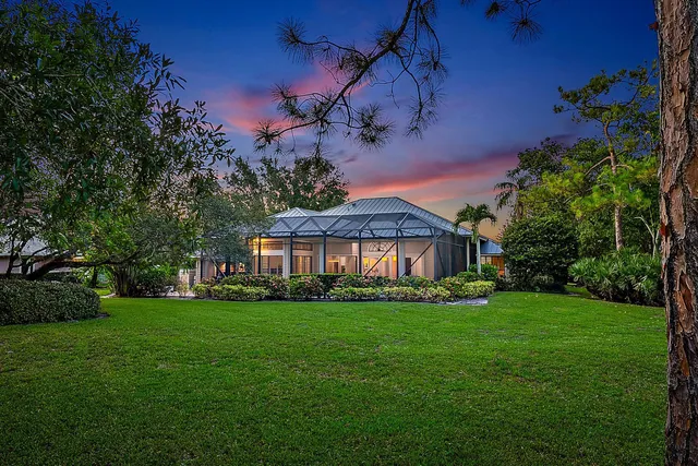 a view of a house with a big yard