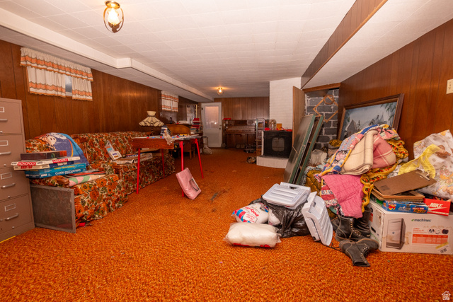 160 North 100 W Street Beaver, UT 84713 - Photo 27 of 36 Recreation room with wood walls and carpet flooring