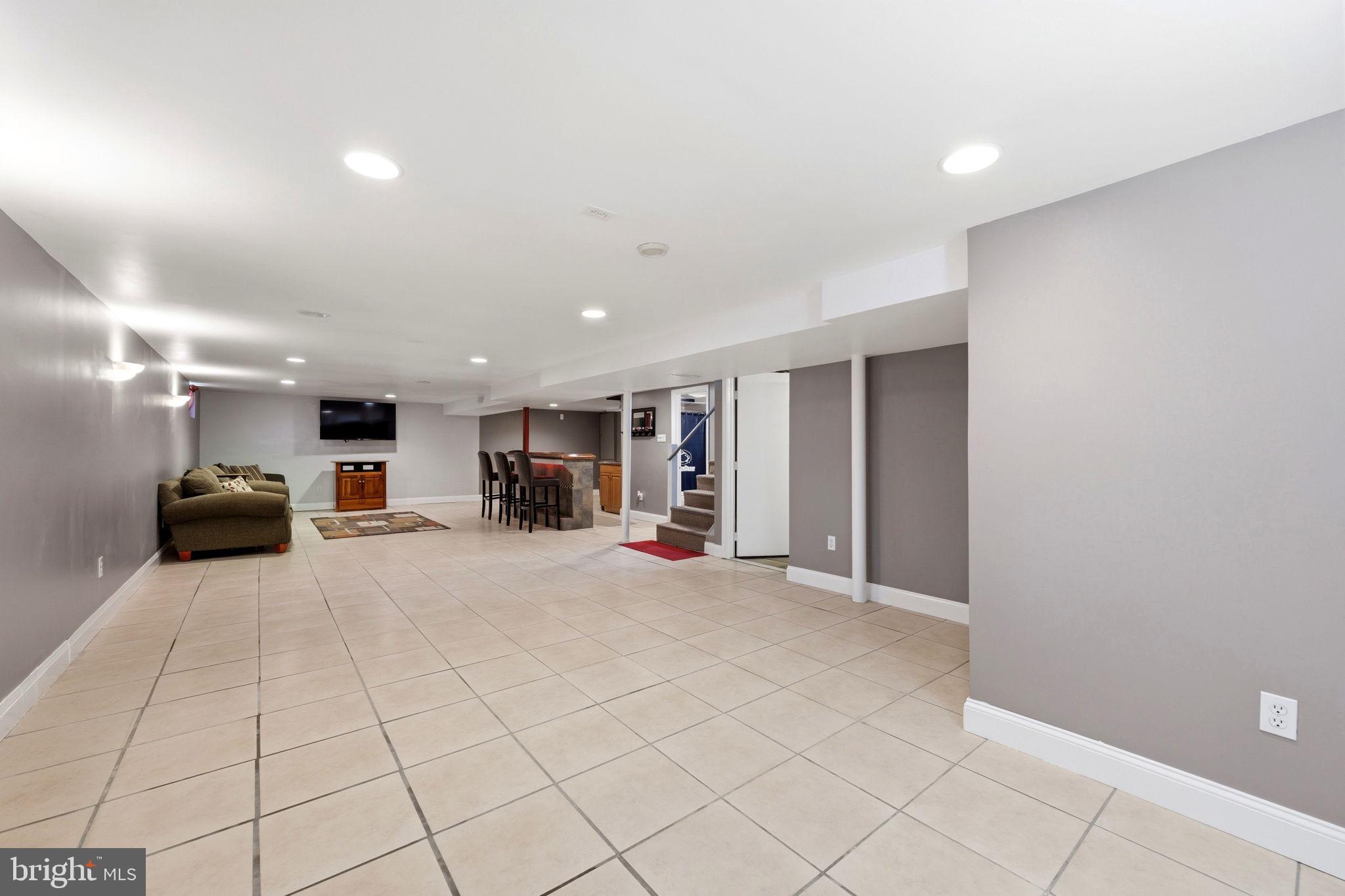 905 Amosland Road Morton, PA 19070 - Photo 32 of 44 Spacious, versatile basement retreat.