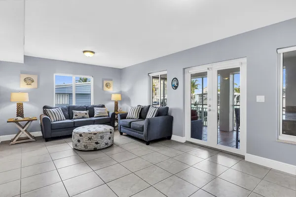 a living room with furniture and window