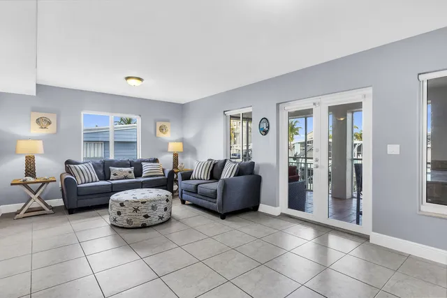a living room with furniture and window