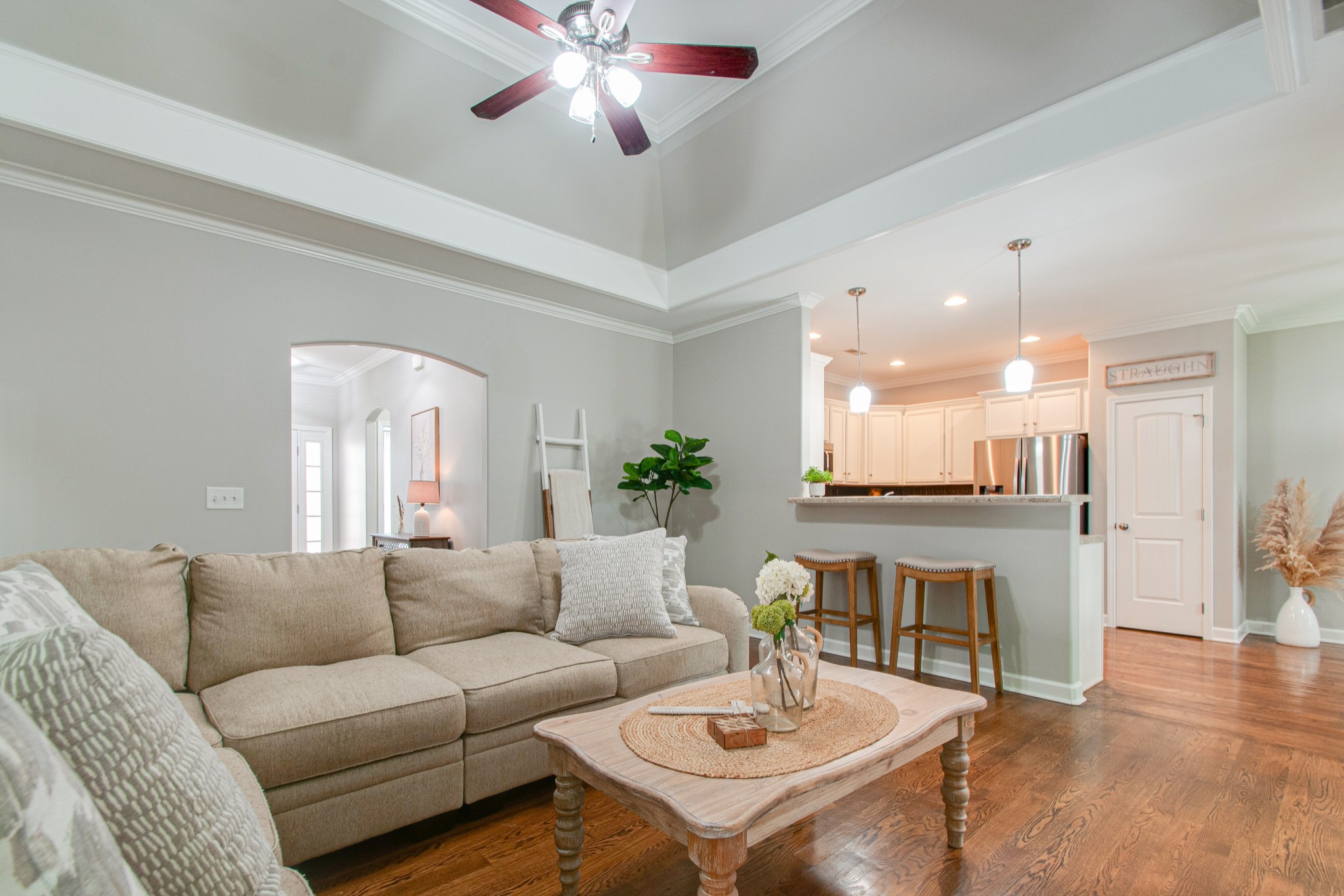 1068 Golf View Way Spring Hill, TN 37174 - Photo 10 of 40 a living room with fireplace furniture and a wooden floor