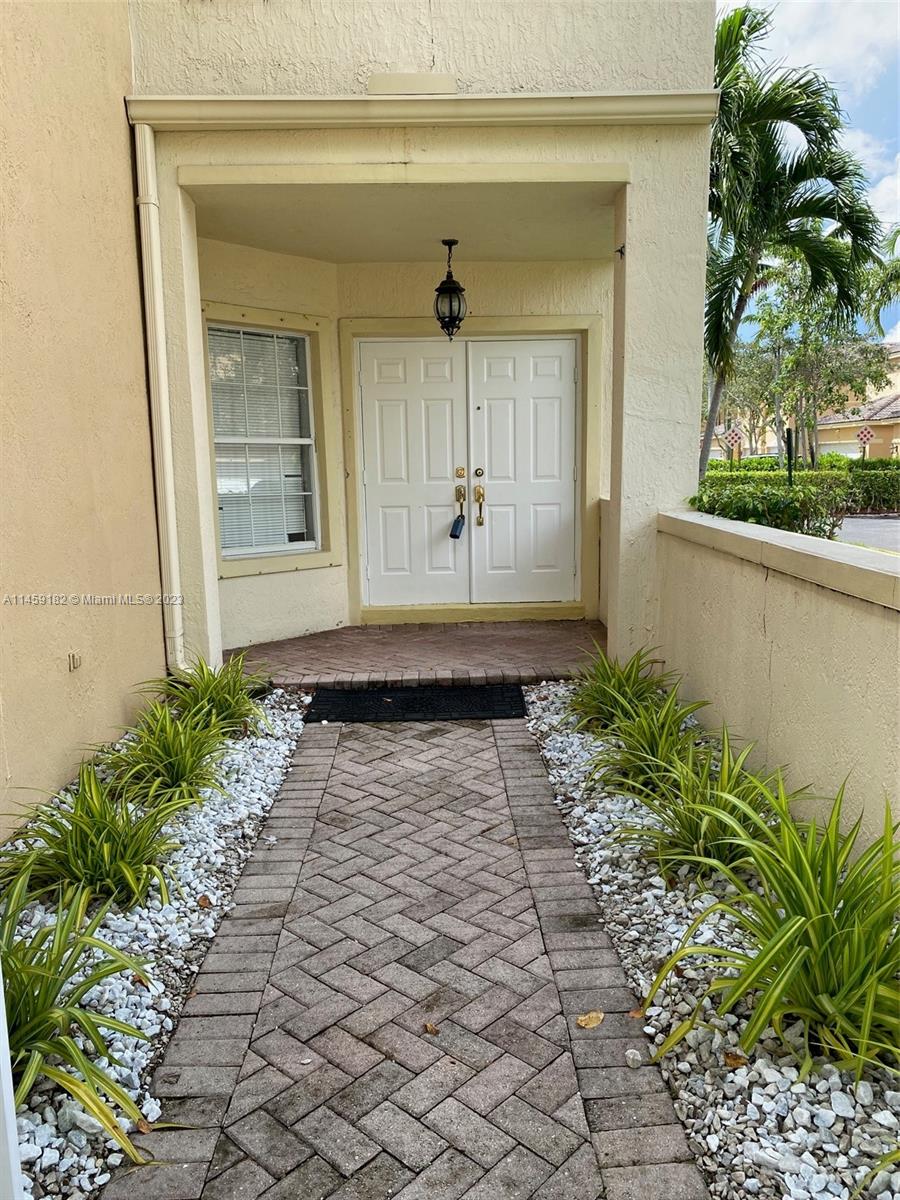 5586 Northwest 112th Path Doral, FL 33178 - Photo 2 of 30 a view of a entryway of the house