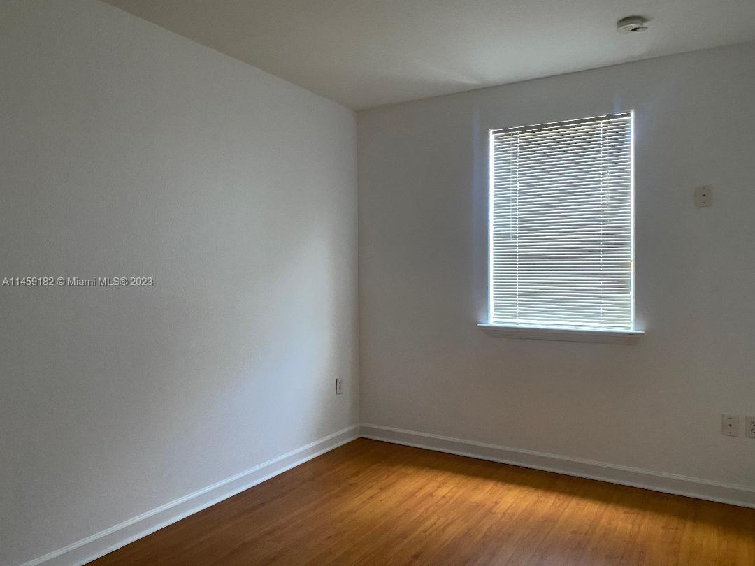 5586 Northwest 112th Path Doral, FL 33178 - Photo 24 of 30 an empty room with a window