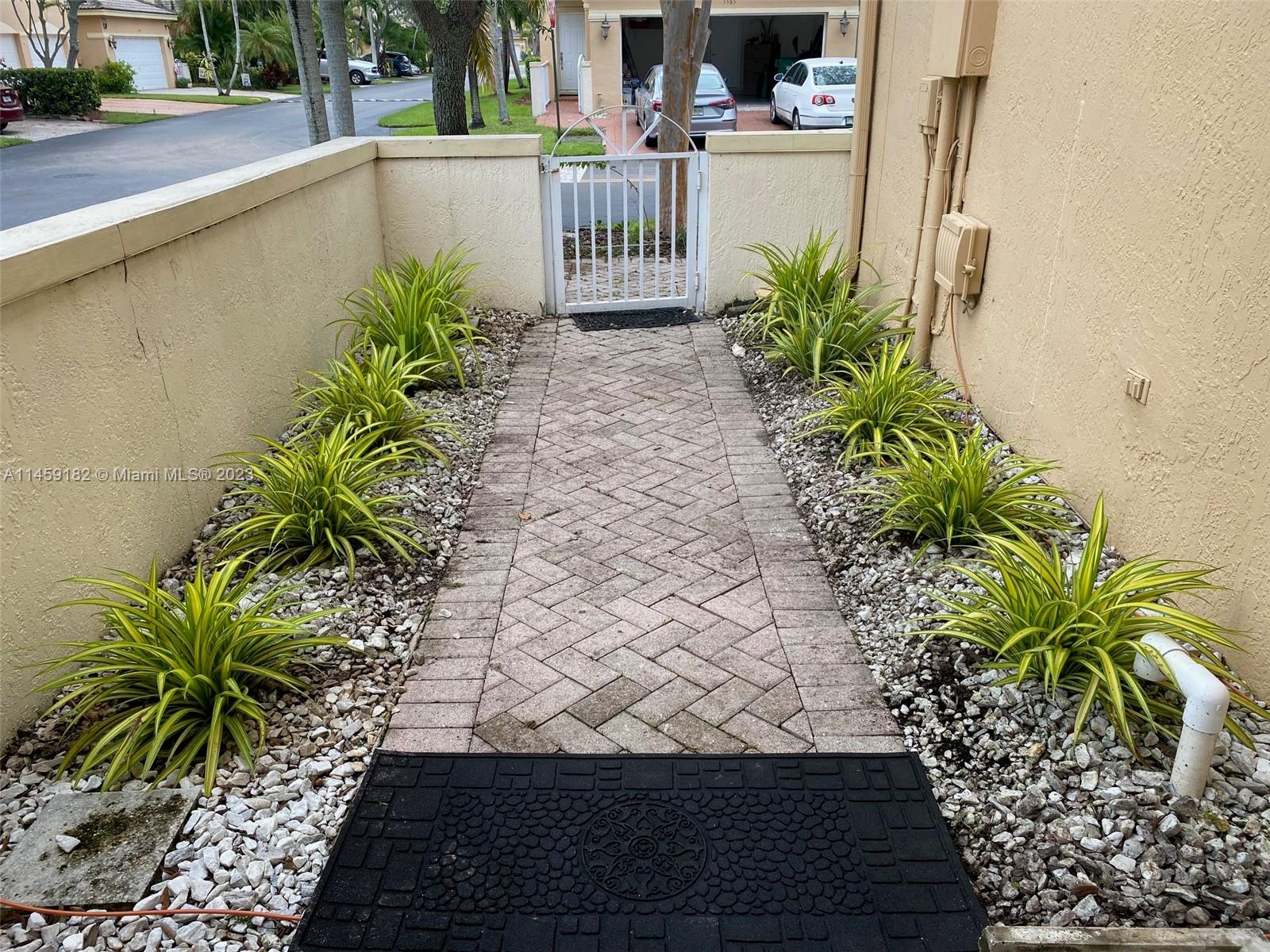 5586 Northwest 112th Path Doral, FL 33178 - Photo 4 of 30 a view of a back yard of the house