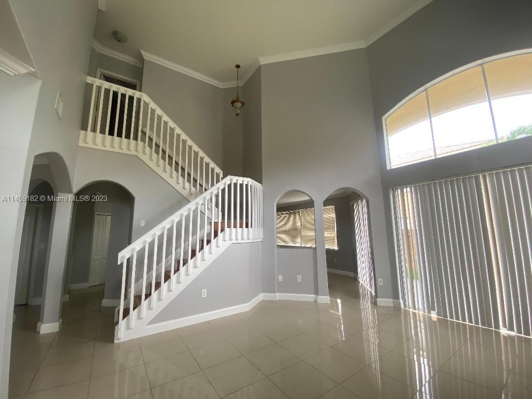 5586 Northwest 112th Path Doral, FL 33178 - Photo 9 of 30 a view of front door