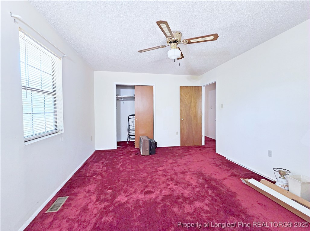 1621 Lobelia Road Vass, NC 28394 - Photo 27 of 50 a view of a livingroom with a workspace