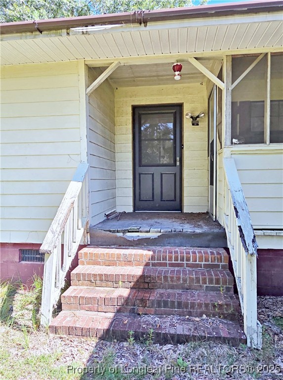 1621 Lobelia Road Vass, NC 28394 - Photo 3 of 50 a front view of a house with a porch