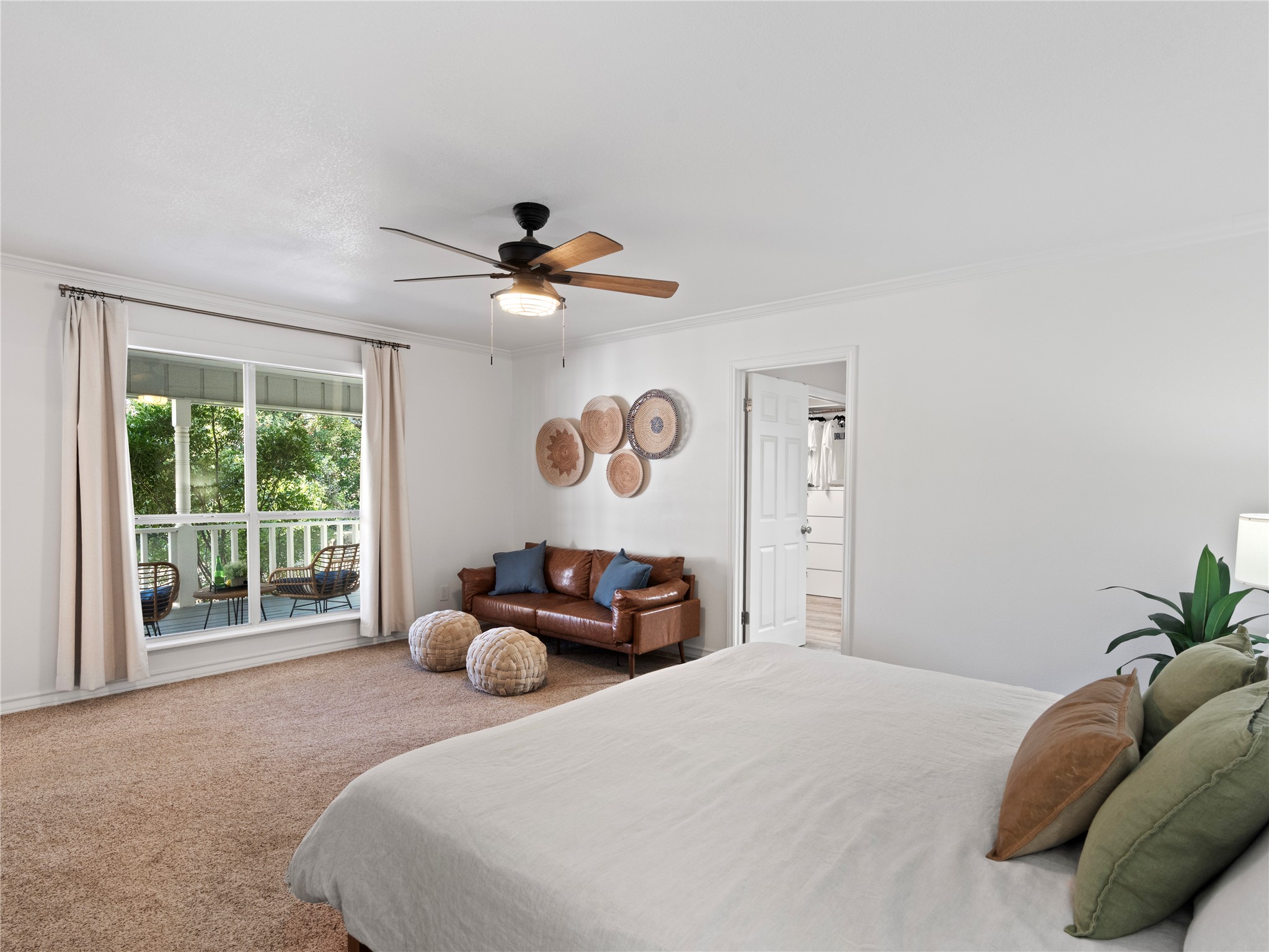 5108 Sioux Lane Austin, TX 78734 - Photo 18 of 35 a bedroom with a bed and a chandelier