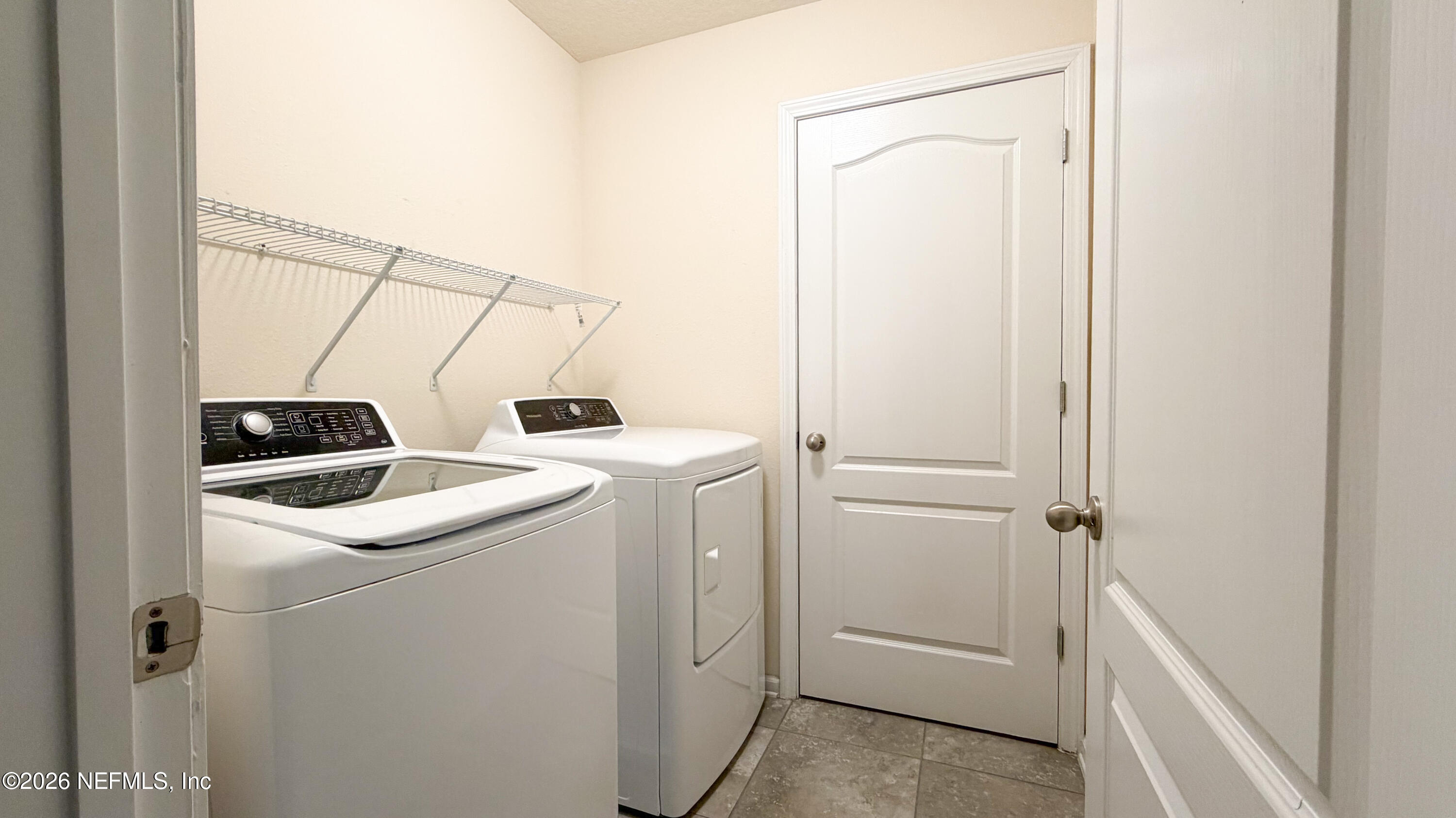 47 Castro Court St. Johns, FL 32259 - Photo 9 of 19 a utility room with dryer and washer