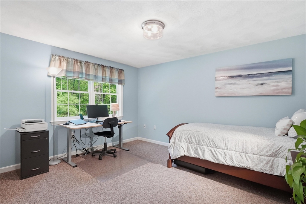 9 Fazio Farm Road Georgetown, MA 01833 - Photo 30 of 42 a bedroom with a bed and a desk
