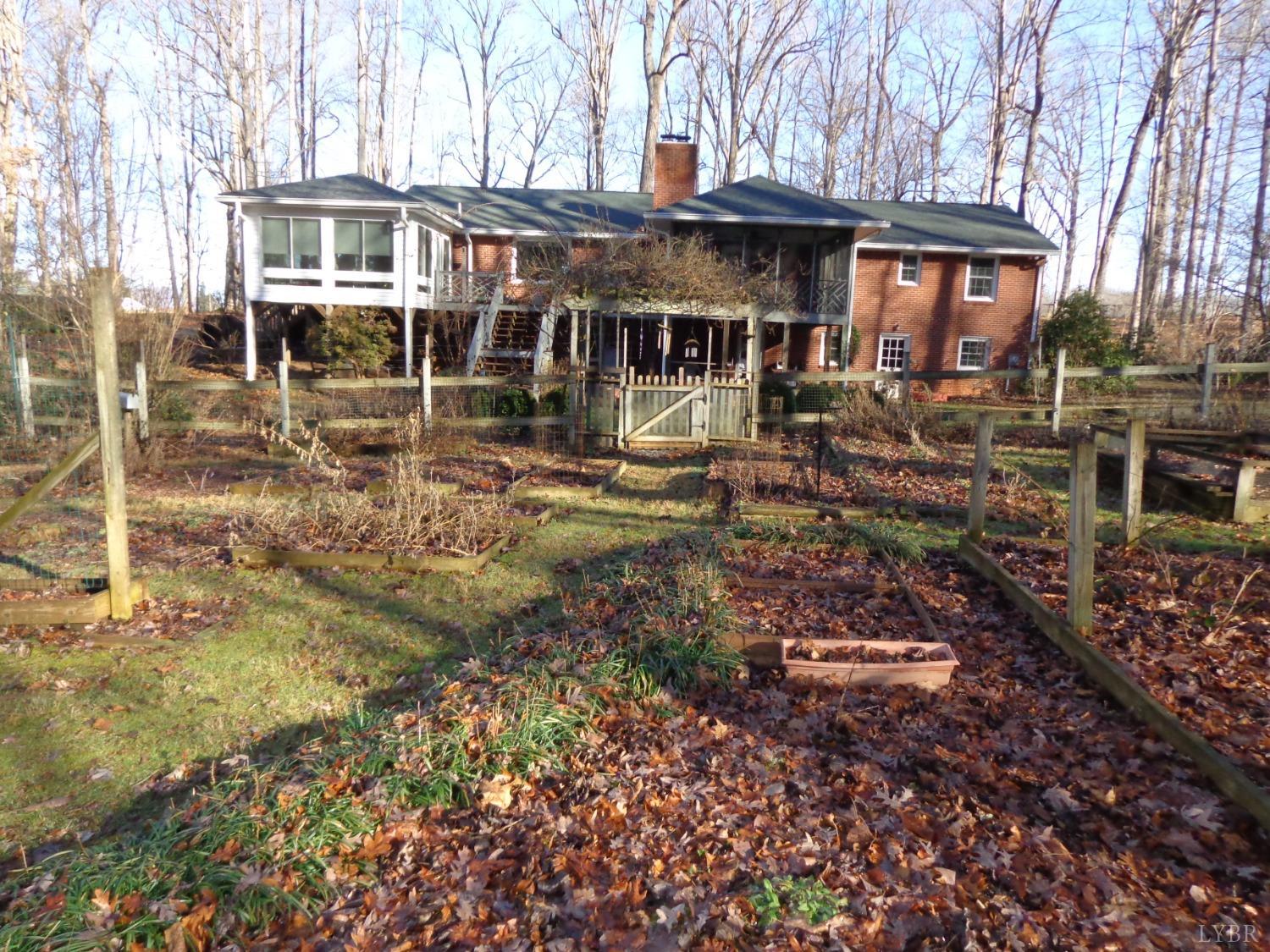 218 Otterview Road Forest, VA 24551 - Photo 11 of 63 a view of a house with a yard and sitting area