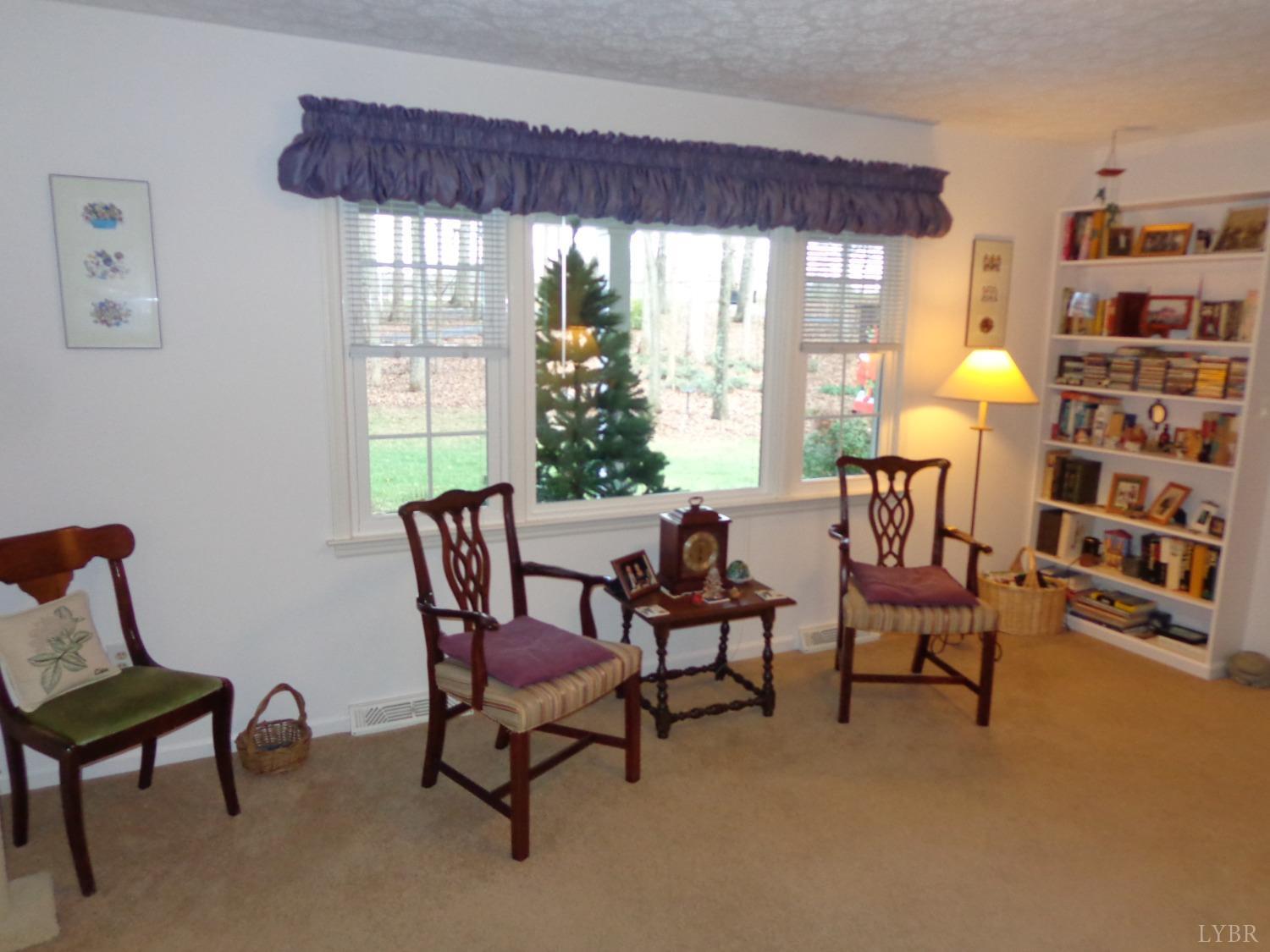 218 Otterview Road Forest, VA 24551 - Photo 18 of 63 a view of a livingroom with furniture and a window