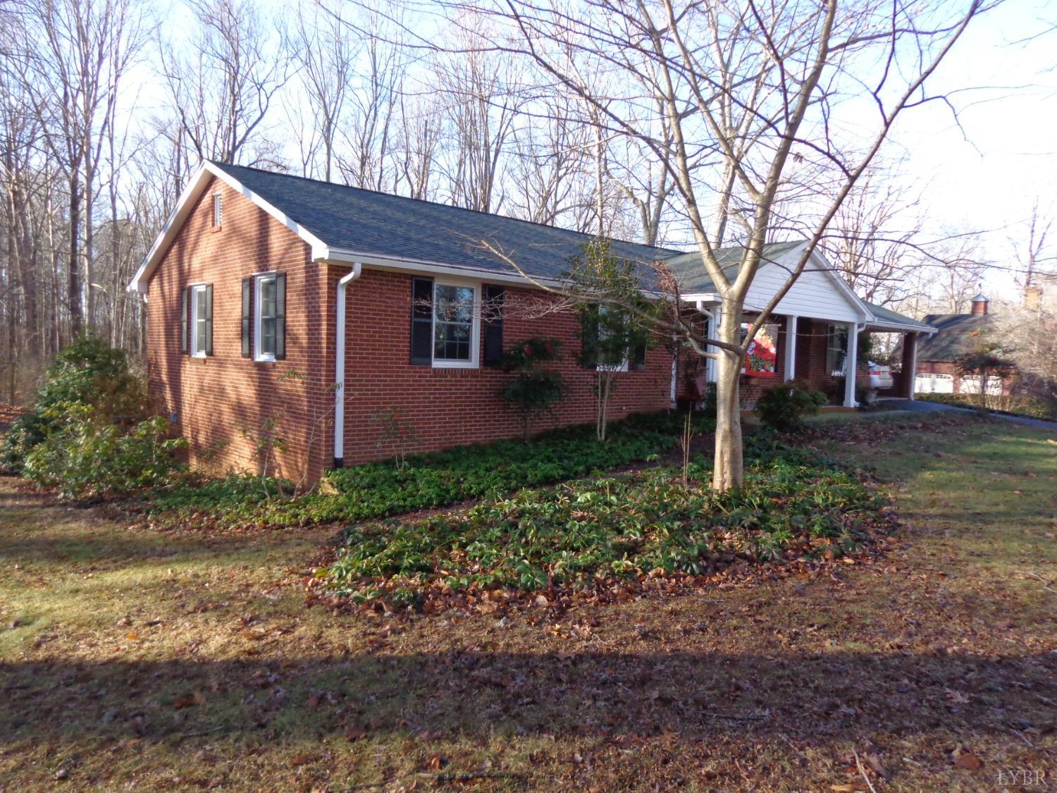 218 Otterview Road Forest, VA 24551 - Photo 2 of 63 a backyard of a house with lots of green space