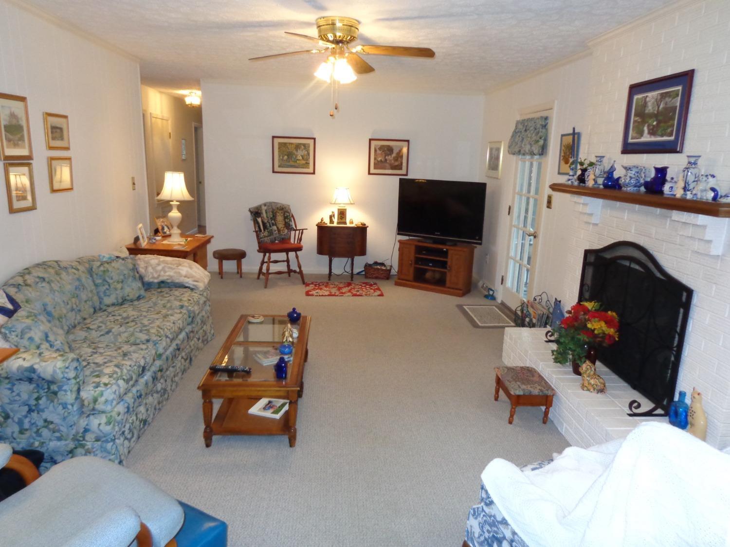 218 Otterview Road Forest, VA 24551 - Photo 22 of 63 a living room with furniture and a flat screen tv