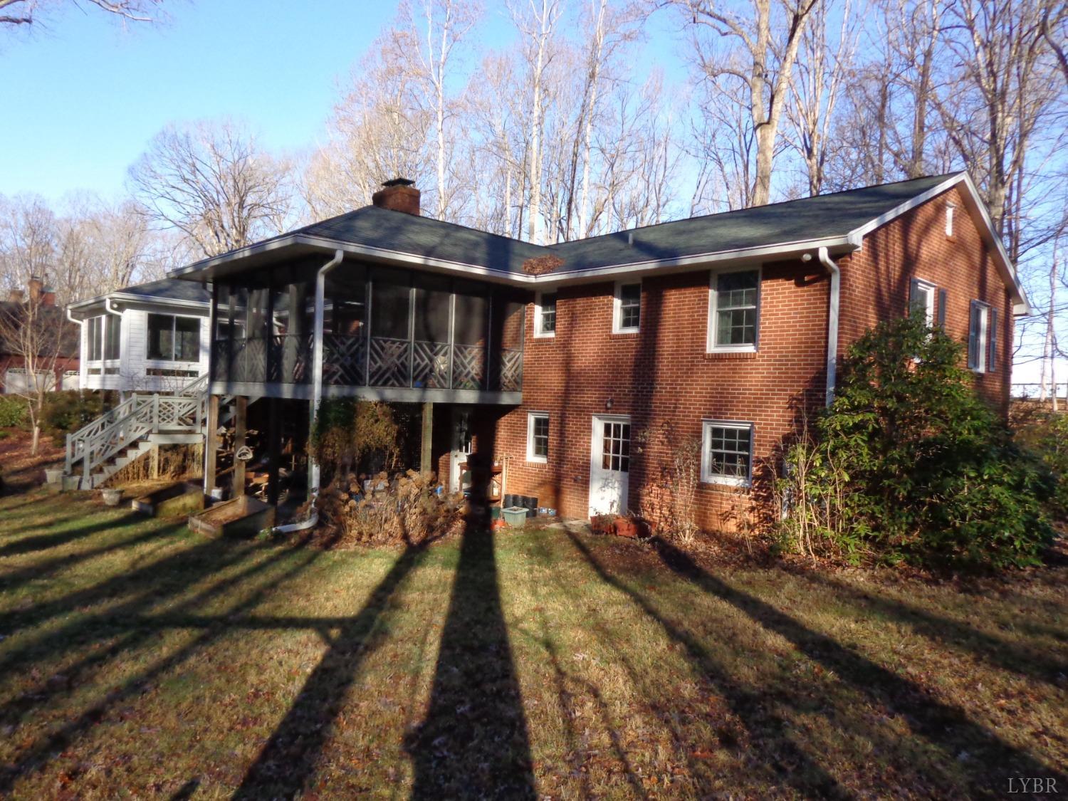 218 Otterview Road Forest, VA 24551 - Photo 4 of 63 a front view of a house with a yard