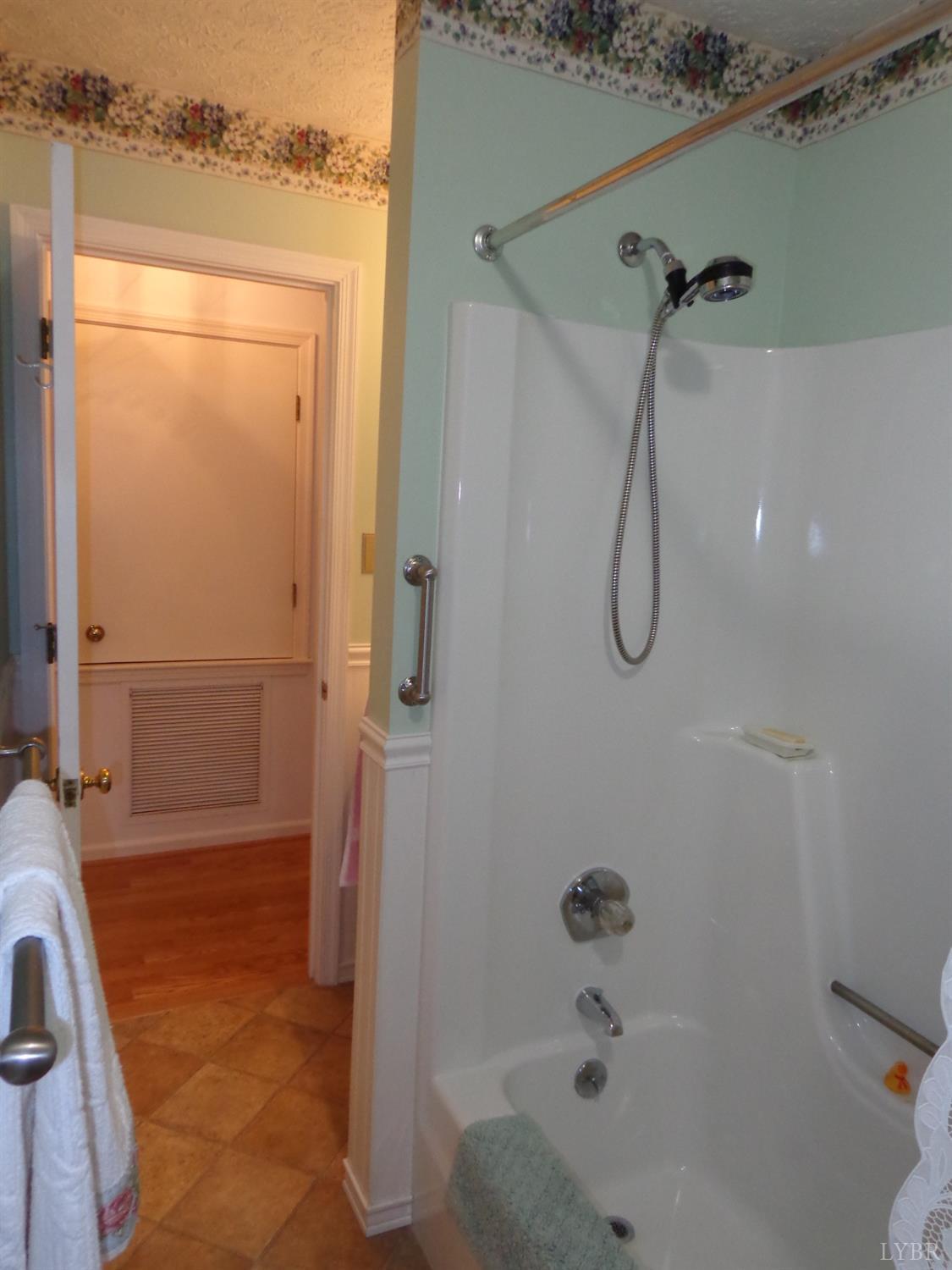 218 Otterview Road Forest, VA 24551 - Photo 46 of 63 a bathroom with a shower and a tub