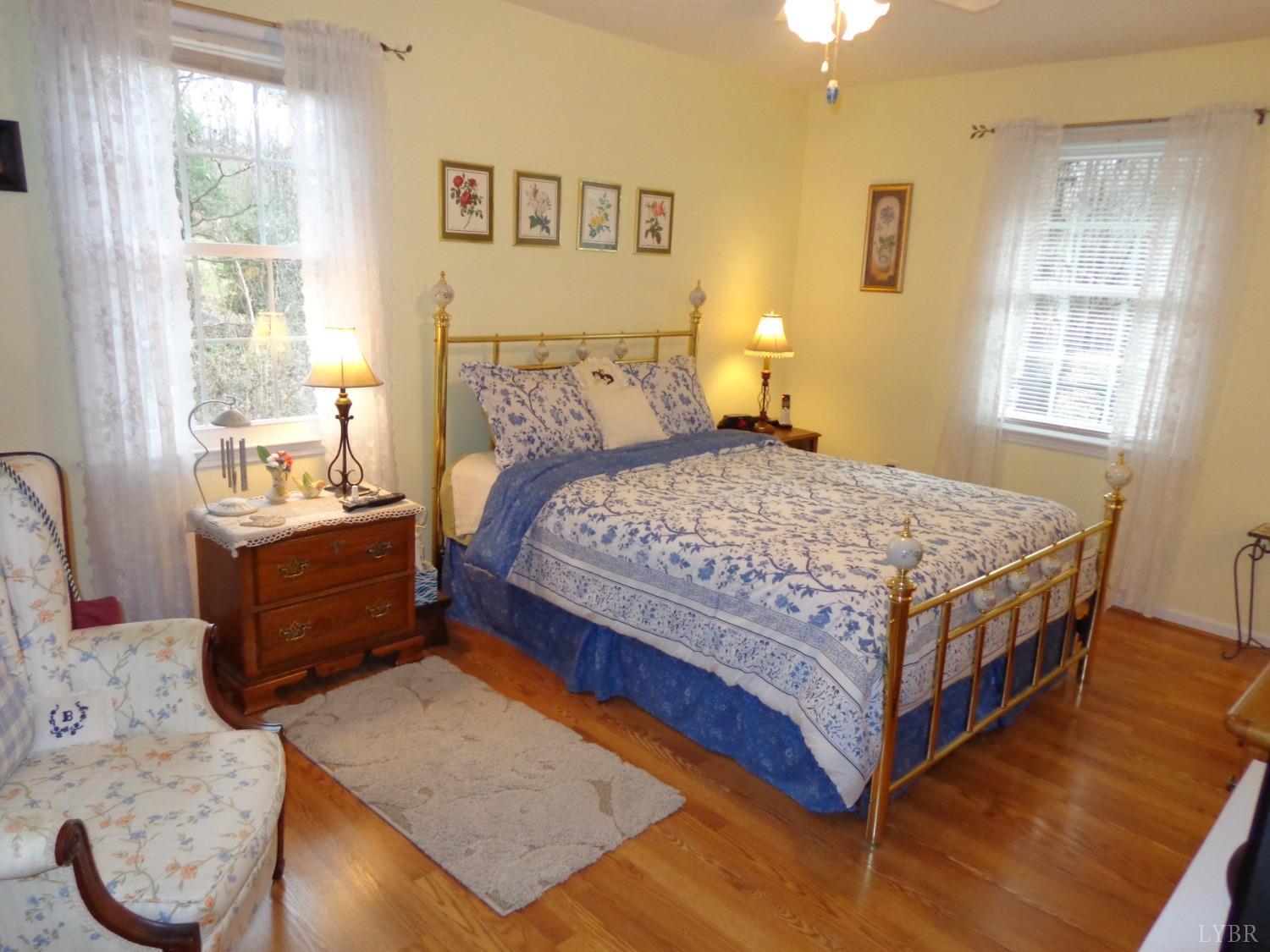 218 Otterview Road Forest, VA 24551 - Photo 50 of 63 a bedroom with a bed and window