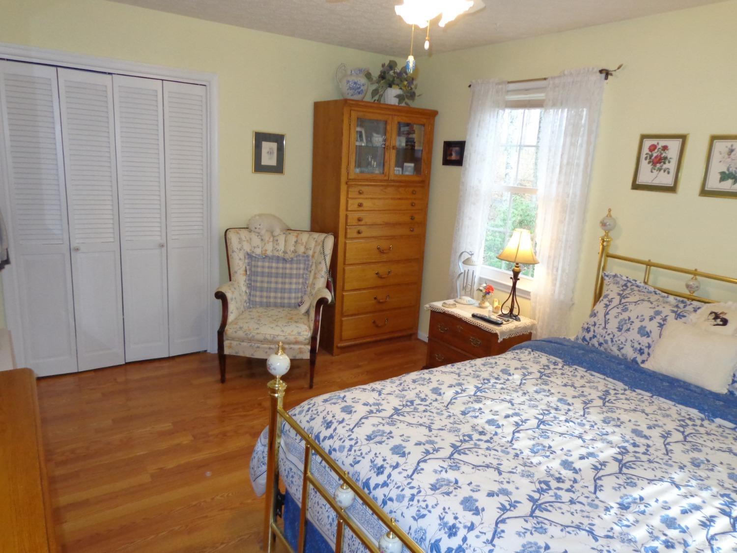 218 Otterview Road Forest, VA 24551 - Photo 51 of 63 a bedroom with a bed and furniture