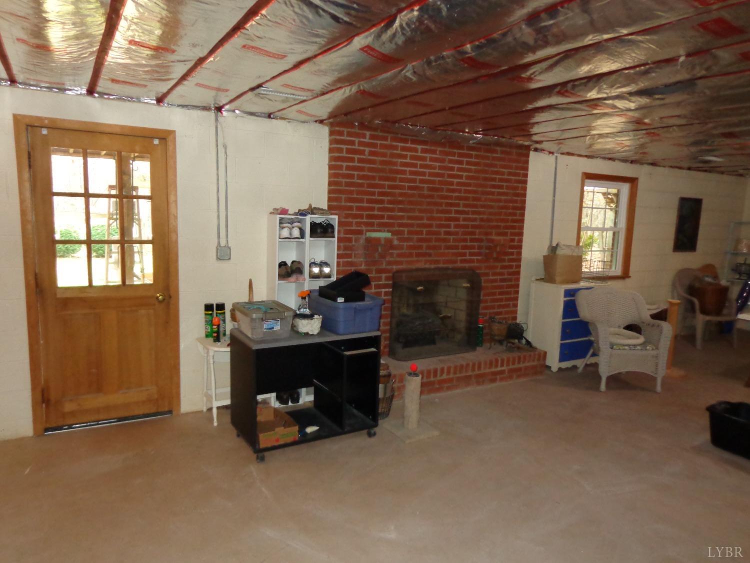218 Otterview Road Forest, VA 24551 - Photo 54 of 63 Full unfinished walkout basement with gas log FP