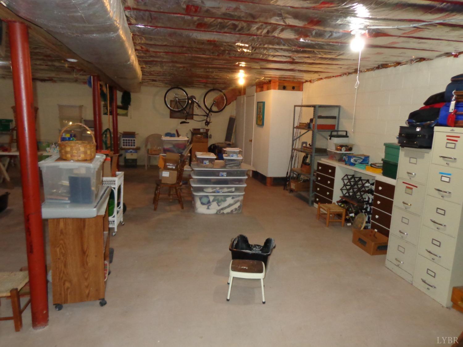 218 Otterview Road Forest, VA 24551 - Photo 55 of 63 Full basement , large cedar closet to right side