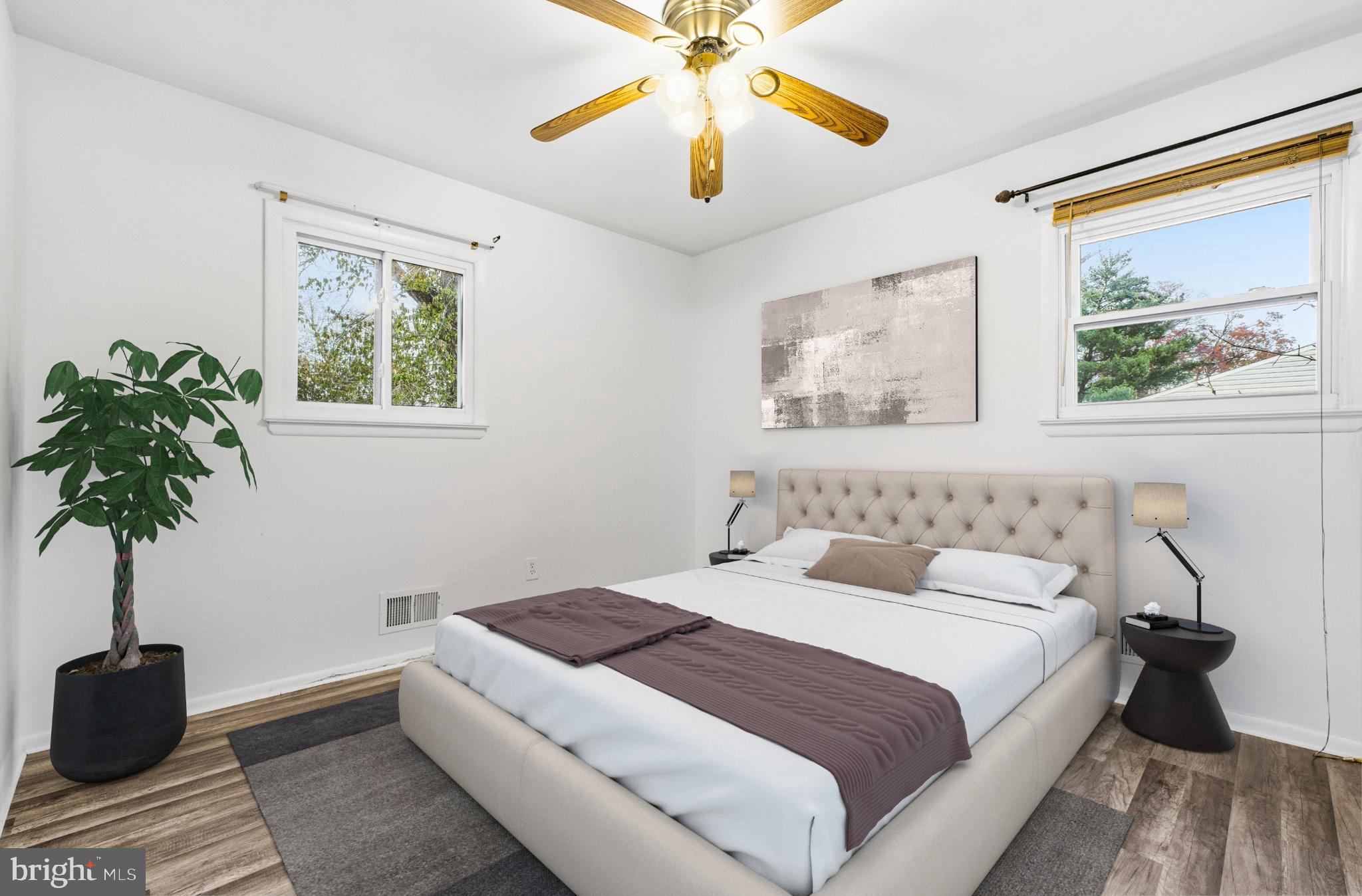80 Mitchell Avenue Piscataway, NJ 08854 - Photo 19 of 32 a bedroom with a large bed and a chandelier