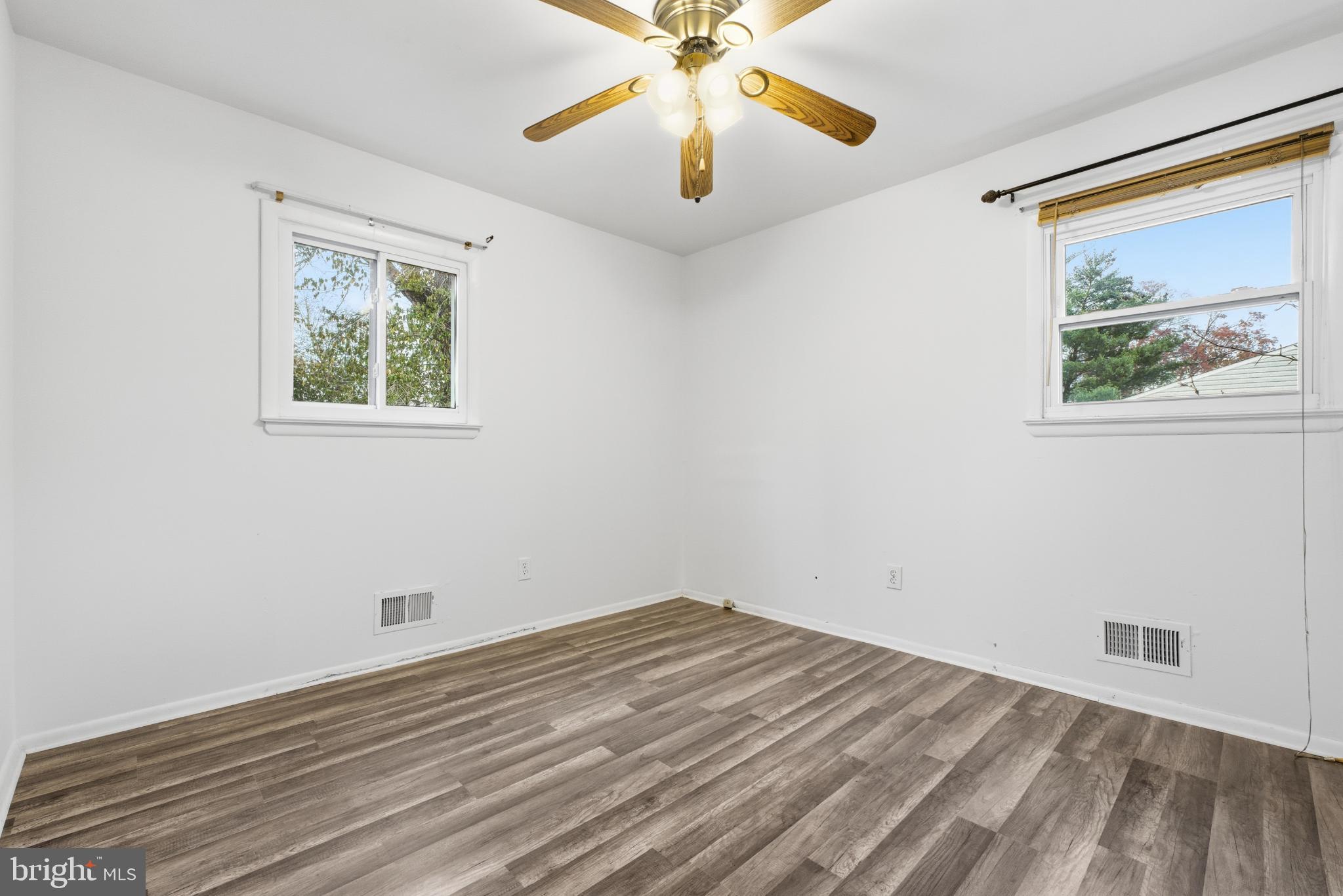 80 Mitchell Avenue Piscataway, NJ 08854 - Photo 20 of 32 a view of empty room with wooden floor
