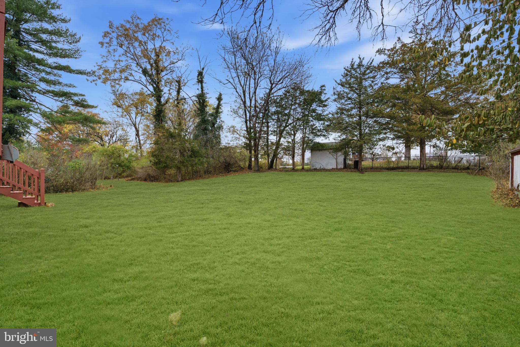 80 Mitchell Avenue Piscataway, NJ 08854 - Photo 32 of 32 a view of a field of grass and trees